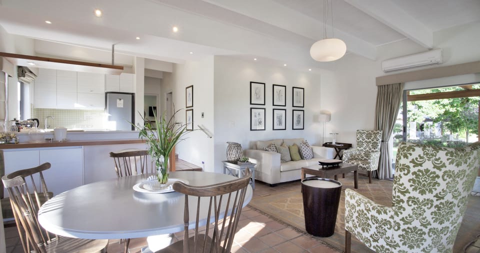 Olive Cottage 1  | Living area | 52-inch Smart TV with satellite channels, TV