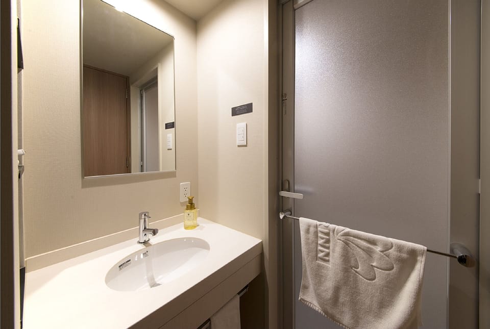 Blackout drapes, iron/ironing board, free WiFi, bed sheets