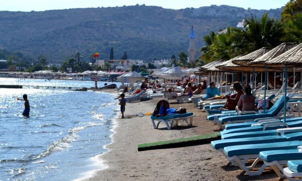 Private beach, sun loungers, beach umbrellas