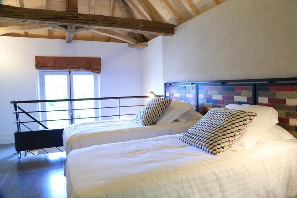 Luxury Suite, 2 Bedrooms (Loft) | Premium bedding, in-room safe, individually decorated