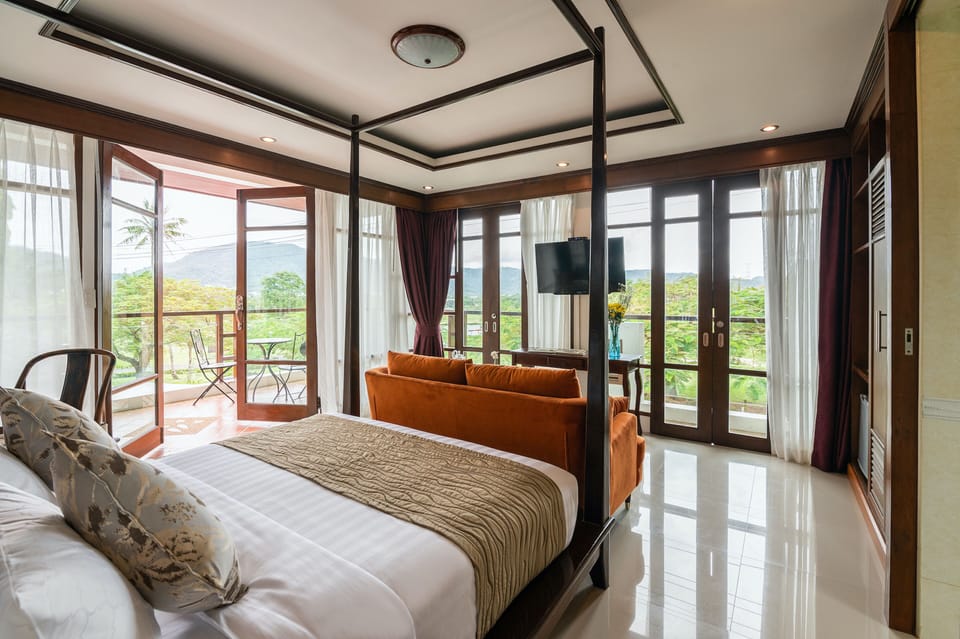 Panoramic Suite, 1 King Bed, Balcony, Golf View | Premium bedding, down comforters, pillowtop beds, free minibar