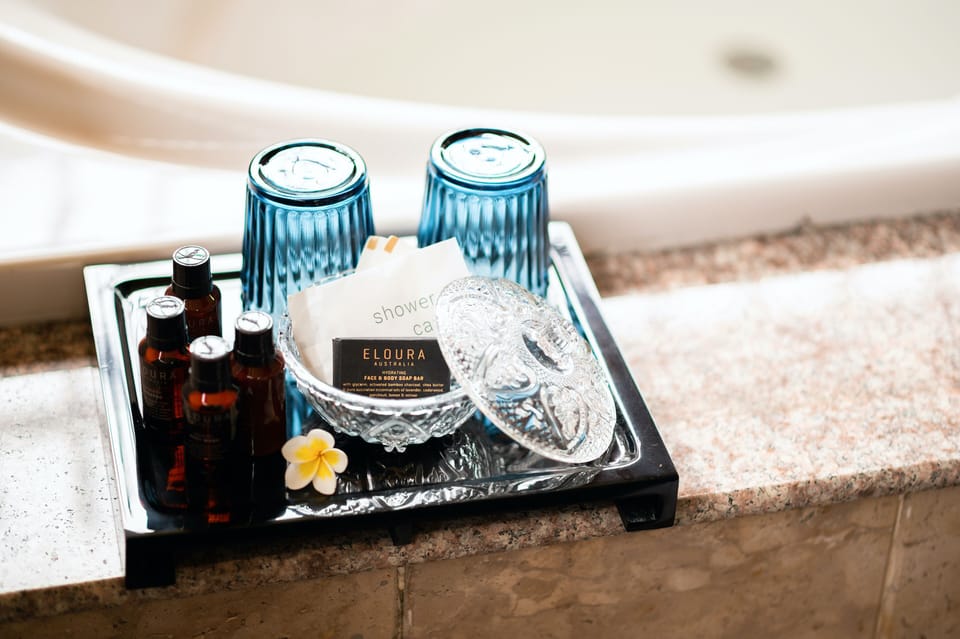 Standard Suite, Pool View | Bathroom amenities | Separate tub and shower, deep soaking tub, rainfall showerhead