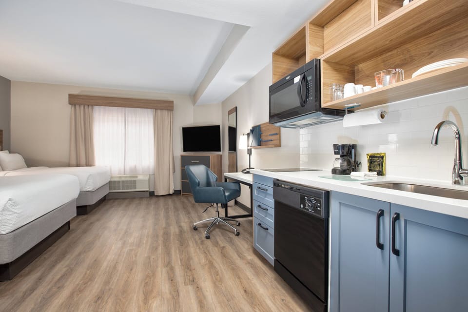 Studio Suite, 2 Queen Beds | In-room safe, desk, laptop workspace, iron/ironing board