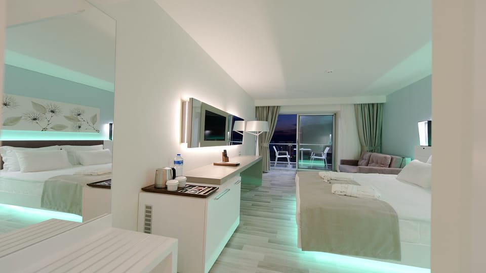 Deluxe Room (Land View) | Minibar, in-room safe, desk, free WiFi