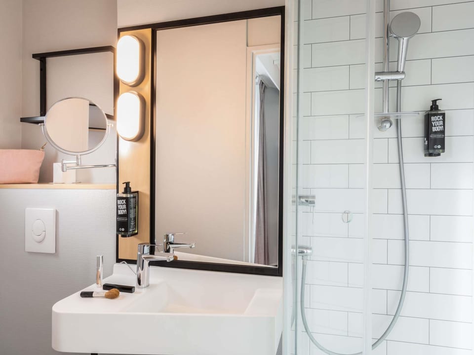 Shower, eco-friendly toiletries, hair dryer, towels