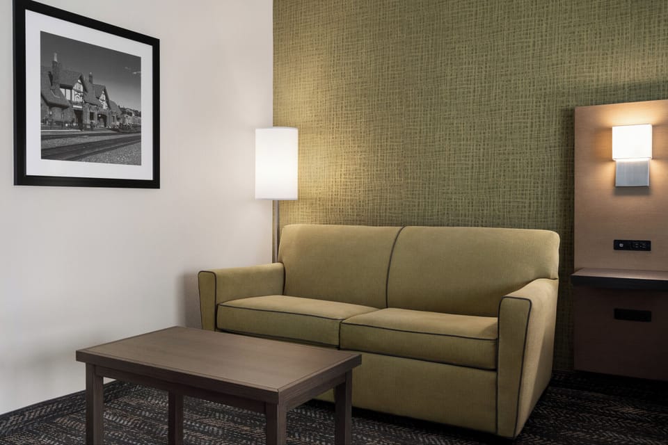 Suite, 1 King Bed with Sofa bed, Non Smoking | Pillowtop beds, in-room safe, iron/ironing board, free cribs/infant beds