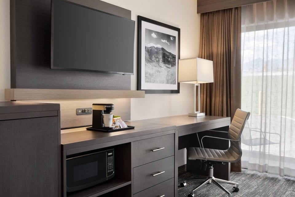 Suite, 1 King Bed with Sofa bed, Non Smoking | Pillowtop beds, in-room safe, iron/ironing board, free cribs/infant beds