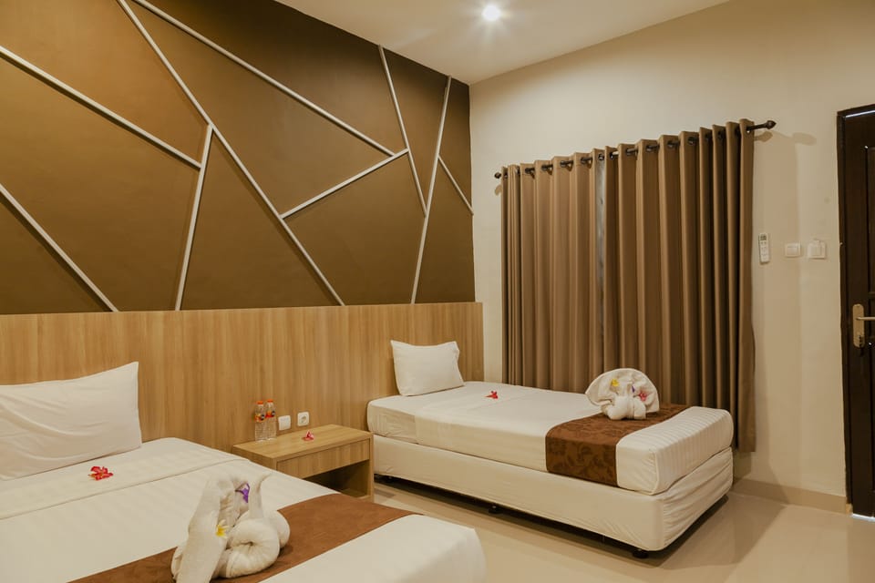 Deluxe Room | Desk, WiFi (free), bed sheets