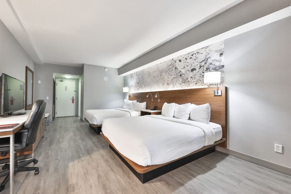 Standard Room, 2 Queen Beds | In-room safe, desk, iron/ironing board, cribs/infant beds