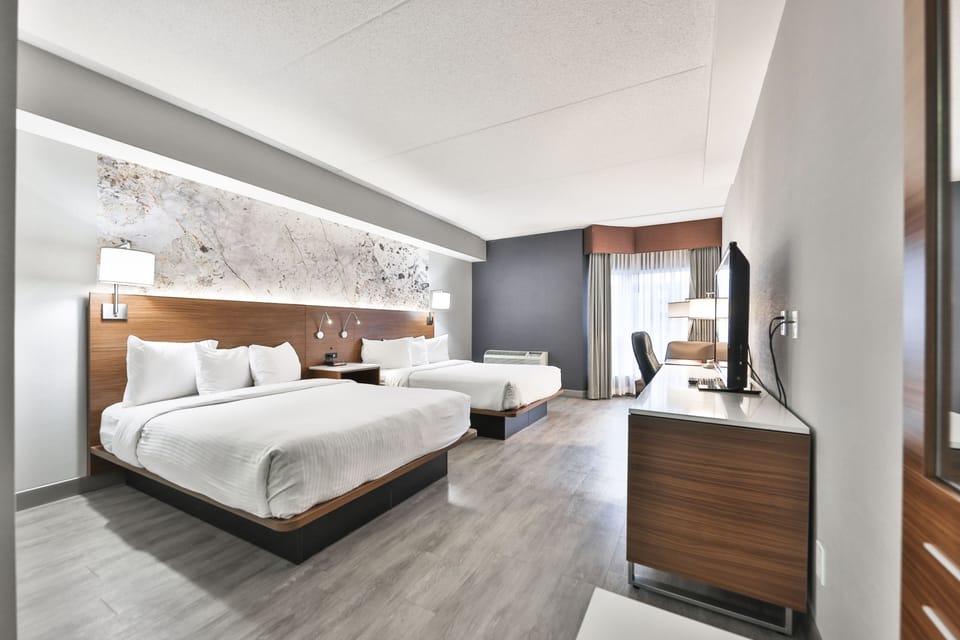 Standard Room, 2 Queen Beds | In-room safe, desk, iron/ironing board, cribs/infant beds