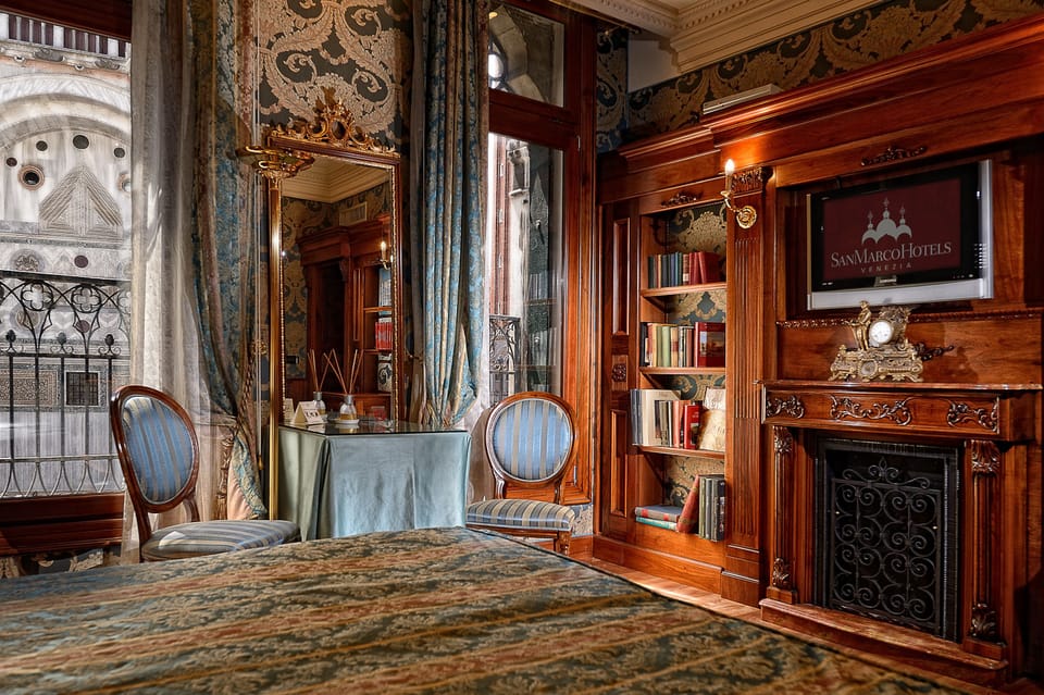Deluxe Double Room (San Marco View) | Minibar, in-room safe, individually decorated, individually furnished