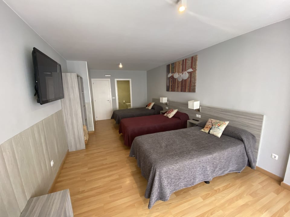 Triple Room, Private Bathroom | Premium bedding, individually furnished, desk, laptop workspace