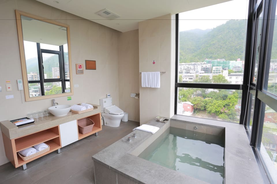 Camel Premium Suite | Bathroom | Separate tub and shower, spring water tub, free toiletries, hair dryer