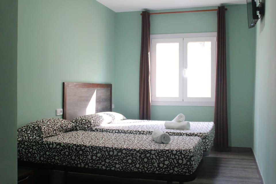 Basic Triple Room | Premium bedding, desk, blackout drapes, iron/ironing board