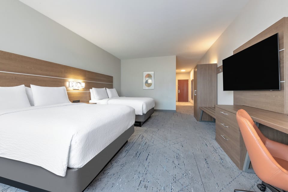 Hypo-allergenic bedding available, in-room safe, desk, laptop workspace