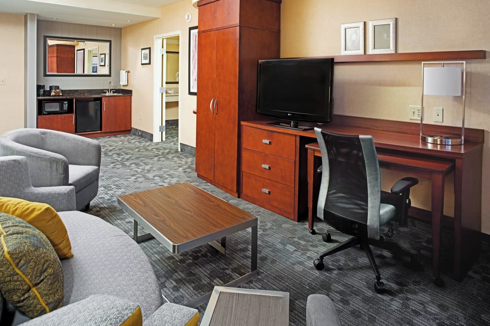 Suite, 1 Bedroom | Living room | Flat-screen TV