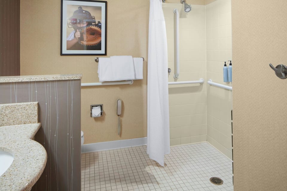 Room, 2 Queen Beds (Mobility/Hearing Access, Roll-In Shwr) | Bathroom | Combined shower/tub, free toiletries, hair dryer, towels
