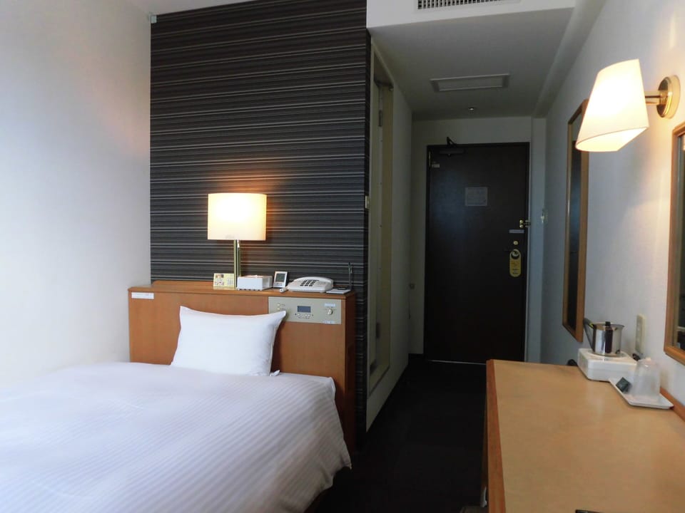 Desk, free WiFi, bed sheets