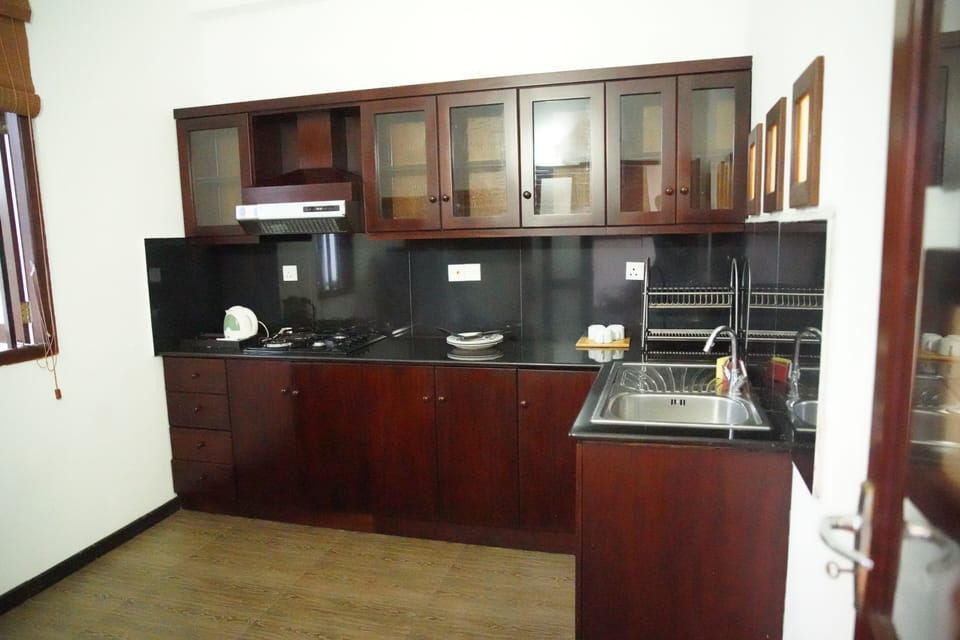 Family Apartment, 1 King Bed, Balcony, Pool View | Minibar, in-room safe, laptop workspace, soundproofing