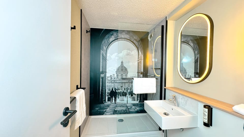 Shower, eco-friendly toiletries, hair dryer, towels