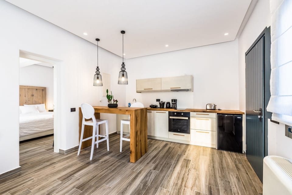 Superior Suite with outdoor Jetted Tub | Private kitchenette | Full-size fridge, oven, stovetop, espresso maker