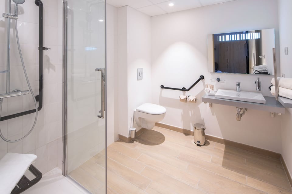 Rainfall showerhead, hair dryer, slippers, towels