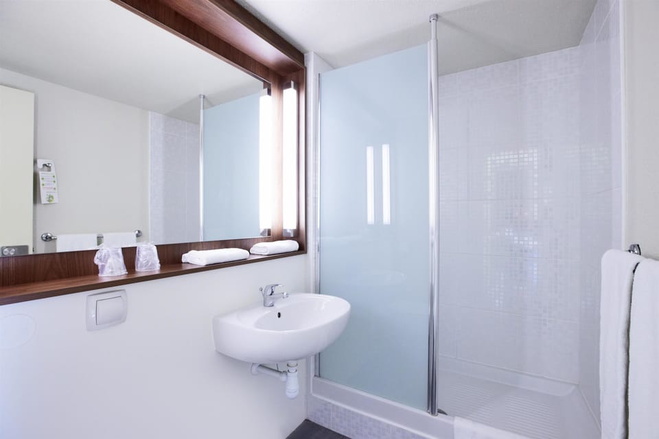 Eco-friendly toiletries, hair dryer, towels