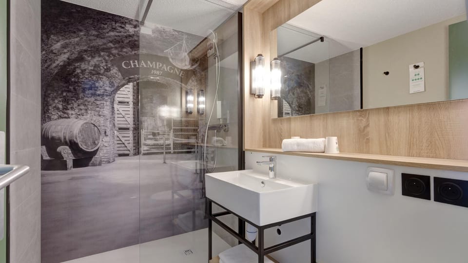 Eco-friendly toiletries, hair dryer, towels, soap