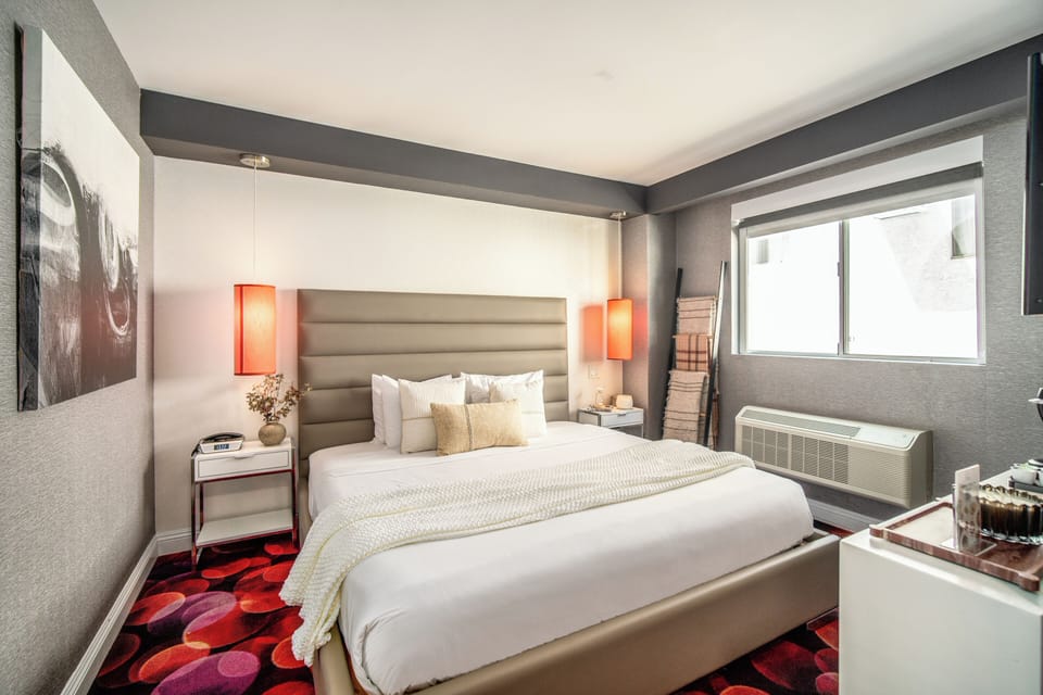 Deluxe Room, 1 King Bed | Premium bedding, blackout drapes, iron/ironing board, free WiFi