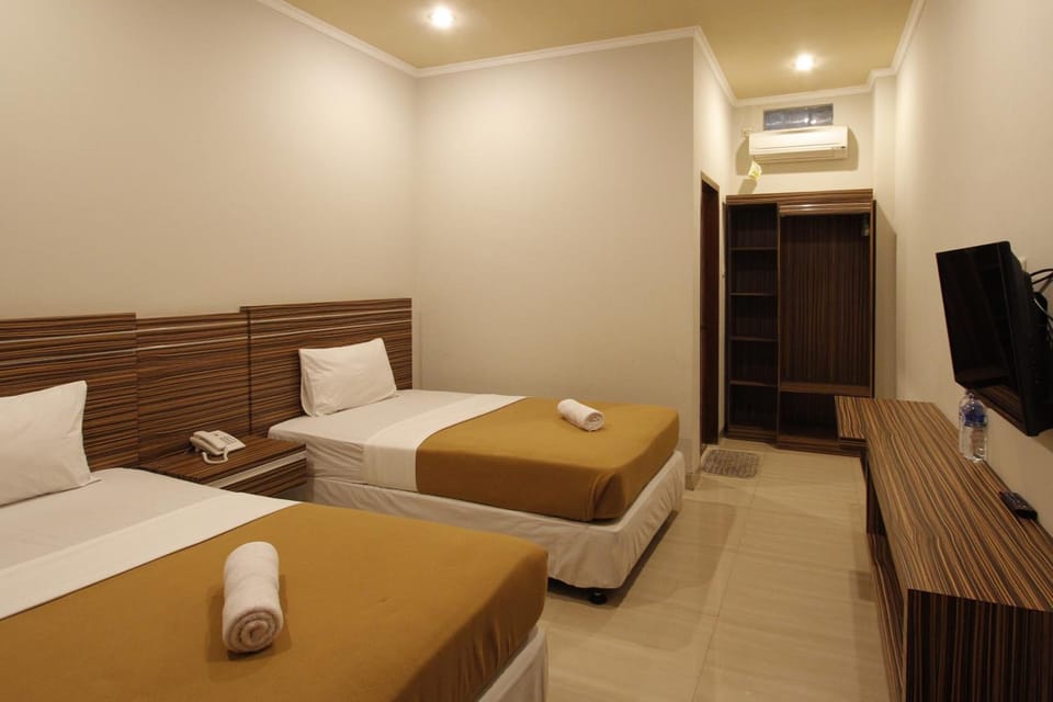 Desk, rollaway beds, WiFi (free), bed sheets