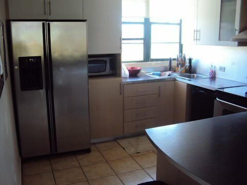 Apartment, 3 Bedrooms | Private kitchen | Coffee/tea maker, fridge, microwave, oven