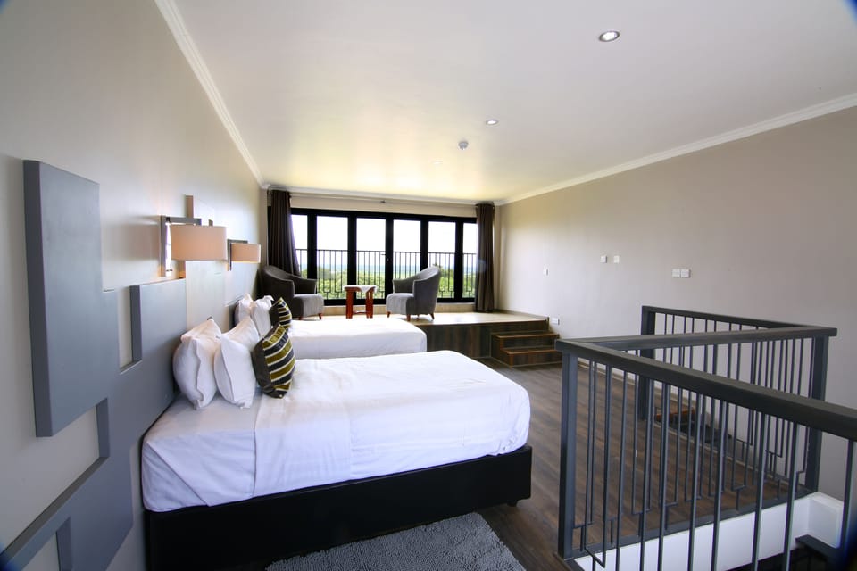 Family Room | In-room safe, desk, blackout drapes, iron/ironing board (on request)