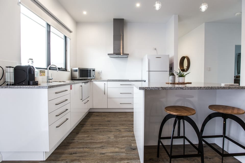 One Bedroom Apartment | Private kitchen | Full-size fridge, microwave, stovetop, dishwasher