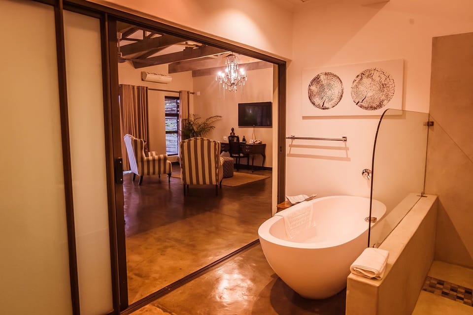 Exclusive Room, 1 Bedroom (Marula Suite ) | Bathroom | Free toiletries, hair dryer, towels, soap