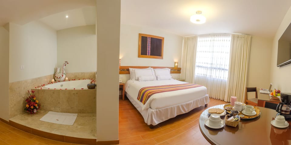 Junior Suite, Jetted Tub | Premium bedding, down comforters, minibar, in-room safe