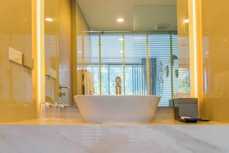 Shower, free toiletries, hair dryer, slippers