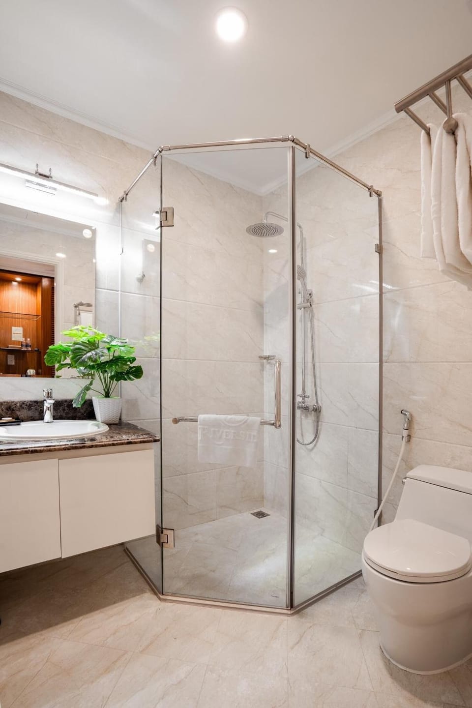 Shower, free toiletries, hair dryer, slippers