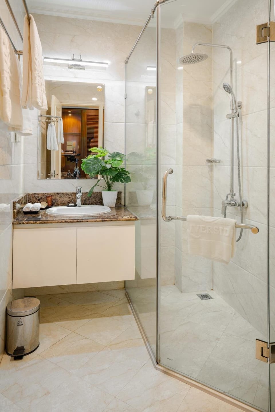 Shower, free toiletries, hair dryer, slippers