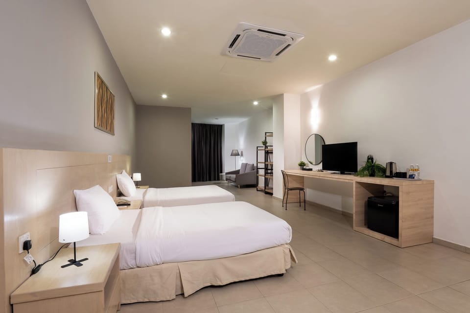 Superior Twin Room | Desk, blackout drapes, iron/ironing board, free WiFi