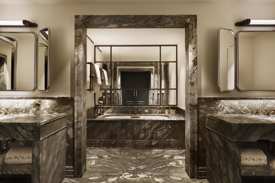Combined shower/tub, rainfall showerhead, hair dryer, bathrobes