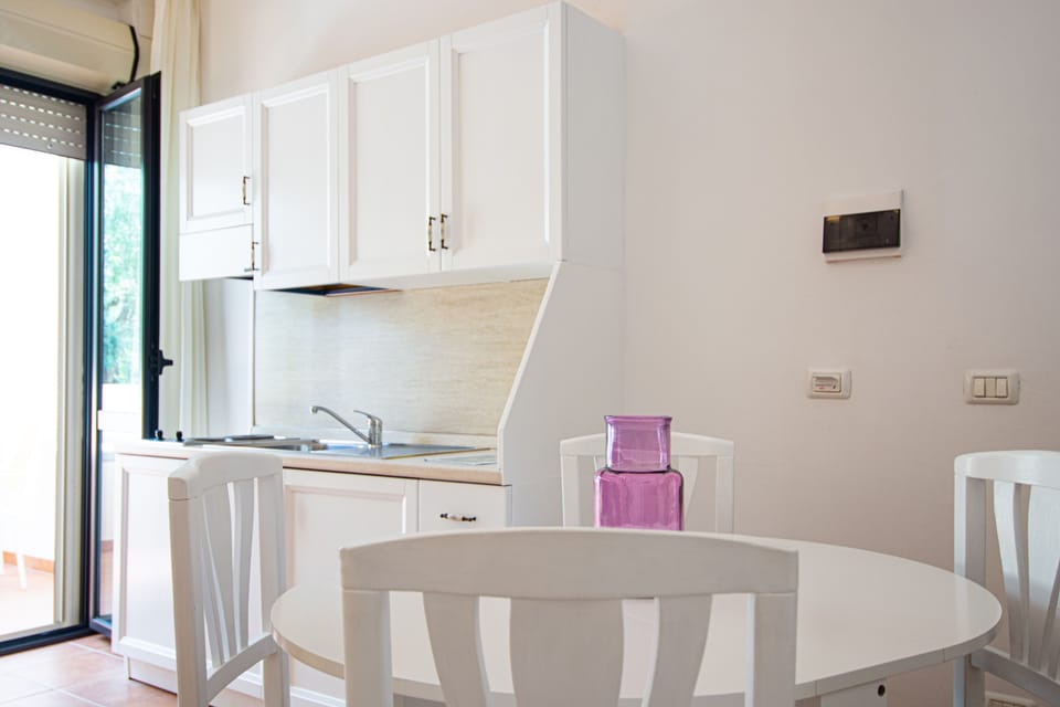 Family Quadruple Room, 1 Queen Bed with Sofa bed, Garden View | Living area | Flat-screen TV