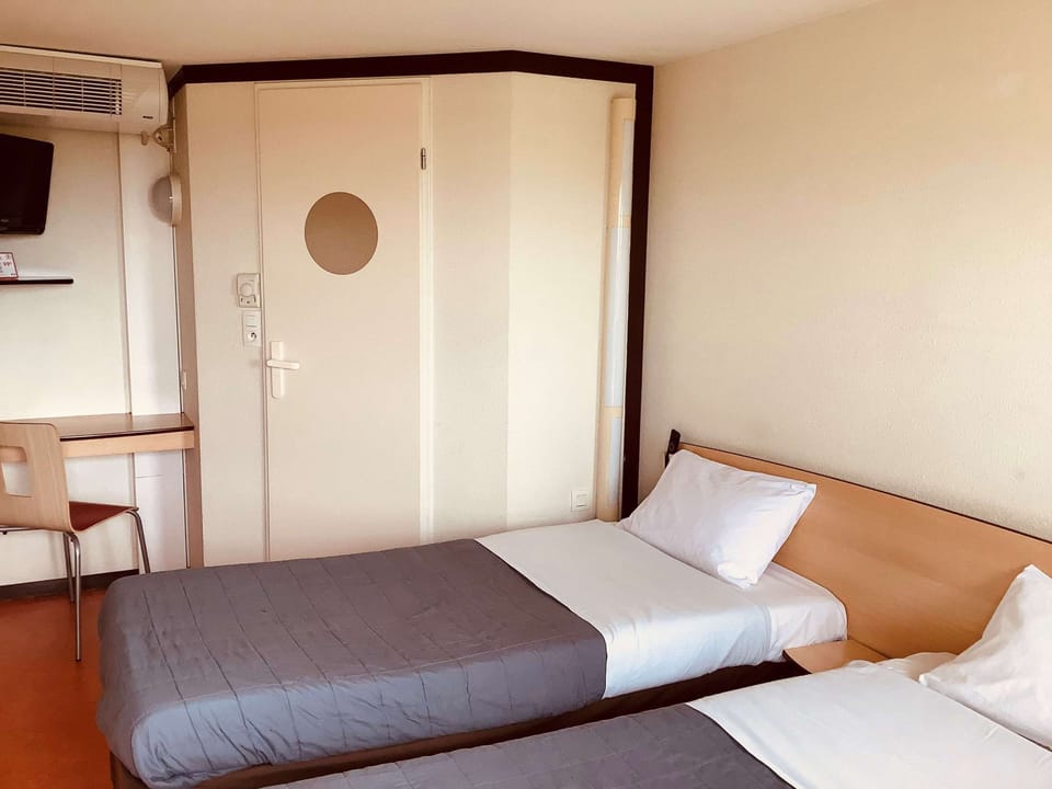 Desk, blackout drapes, free cribs/infant beds, free WiFi