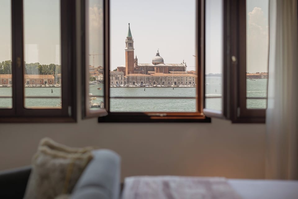 Junior Suite, Lagoon View | Minibar, in-room safe, desk, soundproofing