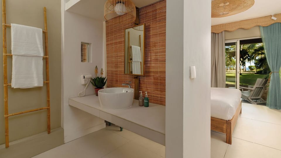 Comfort Room | Bathroom | Shower, designer toiletries, hair dryer, bathrobes