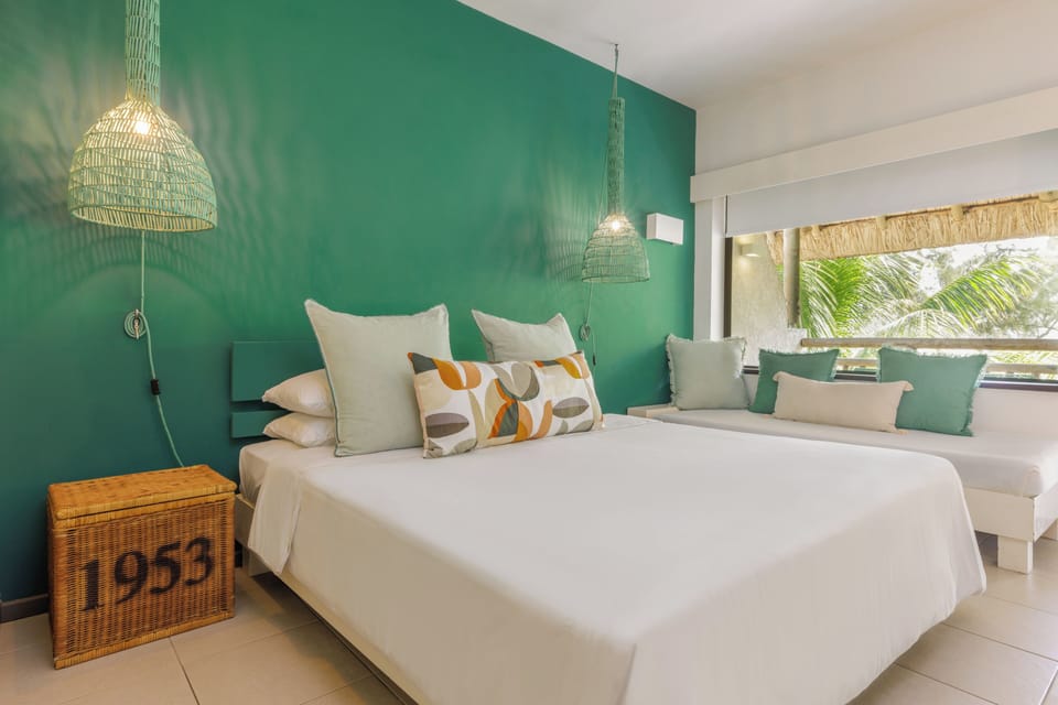 Deluxe Room | Minibar, in-room safe, blackout drapes, cribs (free)