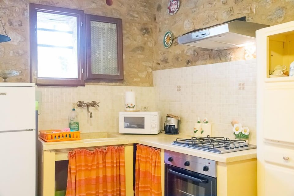 Apartment, 2 Bedrooms | Private kitchenette | Full-size fridge, oven, freezer