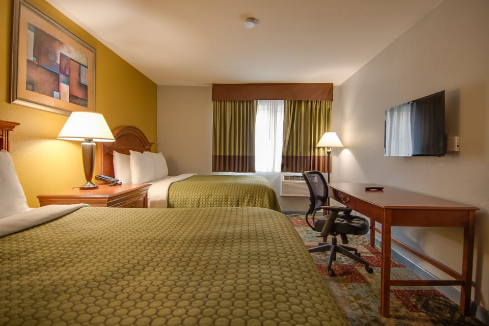 Two Queens, 3rd Floor | Premium bedding, desk, iron/ironing board, free cribs/infant beds