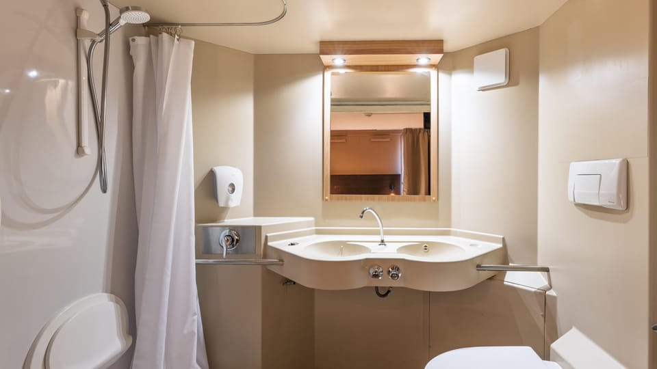 Shower, eco-friendly toiletries, towels, soap