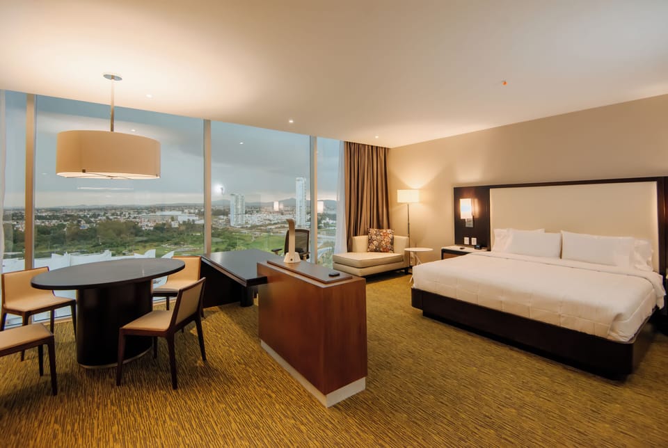 1 King Bed 1 Bedroom Suite | Premium bedding, in-room safe, blackout drapes, WiFi (free)