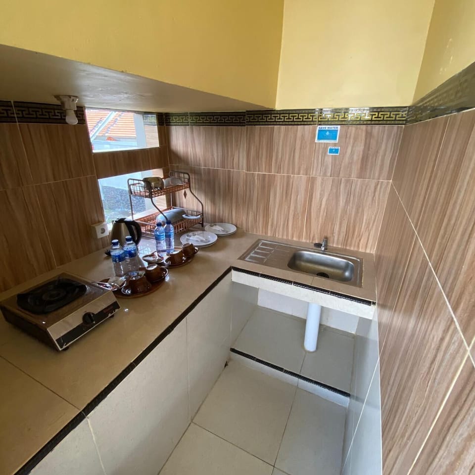Family Room, 2 Bedrooms | Private kitchen